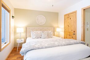 Modern Comfort River/mtn Views + Hot Tub 1 Bedroom Condo by RedAwning