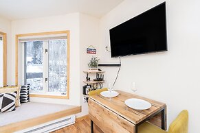 Modern Comfort River/mtn Views + Hot Tub 1 Bedroom Condo by RedAwning