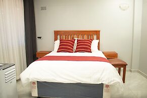 R Executive Apartments