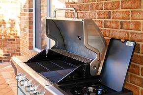 Idyllic Modern Scarborough Home Fireplace BBQ