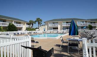 Hook, Wine, & Linger 2 Bedroom Condo by RedAwning