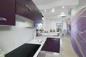 Estate4home- L'Onda Viola