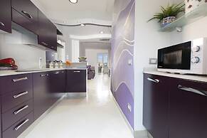 Estate4home- L'Onda Viola