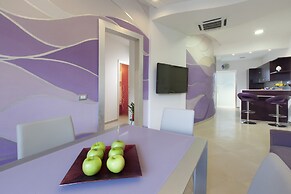 Estate4home- L'Onda Viola