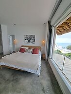 Luxury beachfront villa with private pool and cozy Pavillon with priva