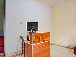 Super OYO 91535 J&b Rooms Tomang