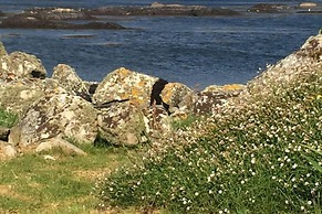 Seaside Log Cabin, Carna