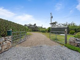 Seaside Log Cabin, Carna