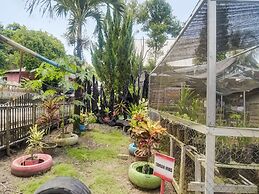 OYO Homes 91148 Homesstay Desa Wisata Bahoi Near Ekowisata Mangrove De