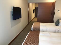 Odysis Suites Osaka Airport Hotel