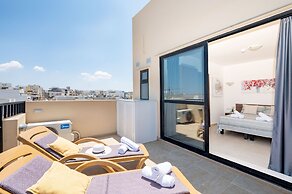 Islet Seafront Penthouse with Hot tub