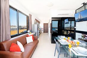 Islet Seafront Penthouse with Hot tub