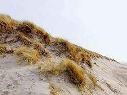 Inviting Dune Chalet in Hollum Near Golf Course