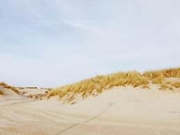 Inviting Dune Chalet in Hollum Near Golf Course