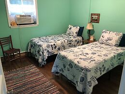 Beach Front On The Bay In Our Rustic, Pet Friendly Cottage 4 Bedroom C