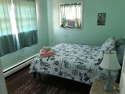 Beach Front On The Bay In Our Rustic, Pet Friendly Cottage 4 Bedroom C