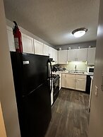 2 BR con patio por el centro comercial