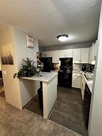 2 BR con patio por el centro comercial