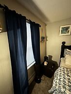 2 BR con patio por el centro comercial