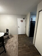 2 BR con patio por el centro comercial