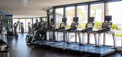 2 BR con patio por el centro comercial