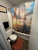 2 BR con patio por el centro comercial