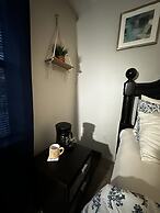 2 BR con patio por el centro comercial