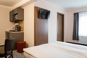 Point Hotel Apartments & Rooms