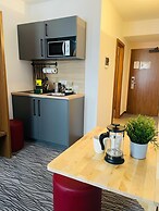 Point Hotel Apartments & Rooms