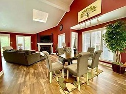 80BPD, Four bedroom, two 1/2 bath log-sided condo with lake view , gar