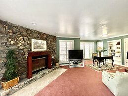 80BPD, Four bedroom, two 1/2 bath log-sided condo with lake view , gar