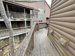 80BPD, Four bedroom, two 1/2 bath log-sided condo with lake view , gar