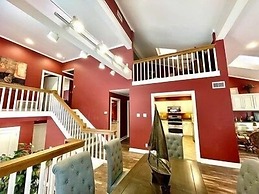 80BPD, Four bedroom, two 1/2 bath log-sided condo with lake view , gar