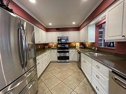 80BPD, Four bedroom, two 1/2 bath log-sided condo with lake view , gar