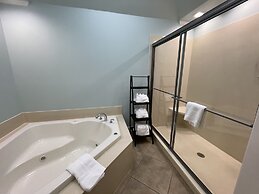 80BPD, Four bedroom, two 1/2 bath log-sided condo with lake view , gar