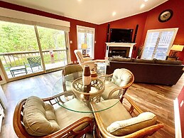 80BPD, Four bedroom, two 1/2 bath log-sided condo with lake view , gar