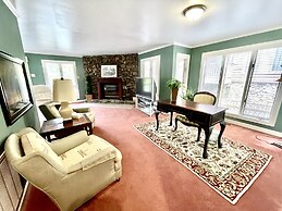 80BPD, Four bedroom, two 1/2 bath log-sided condo with lake view , gar