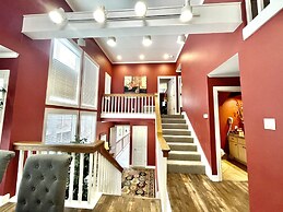 80BPD, Four bedroom, two 1/2 bath log-sided condo with lake view , gar