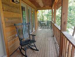 Forest view, log-sided two bedroom, two bath condo on Lake Ouachita. b