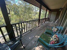 Forest view, log-sided two bedroom, two bath condo on Lake Ouachita. b