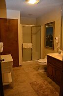 Forest view, log-sided two bedroom, two bath condo on Lake Ouachita. b