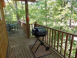 Forest view, log-sided two bedroom, two bath condo on Lake Ouachita. b