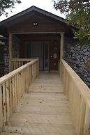 Forest view, log-sided two bedroom, two bath condo on Lake Ouachita. b