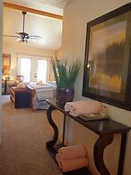 Lake view three bedroom, three bath cottage with private hot tub overl