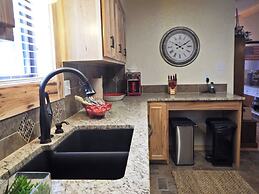 Lake view three bedroom, three bath cottage with private hot tub overl