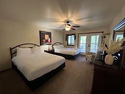 Lake view three bedroom, three bath log-sided cottage with private hot