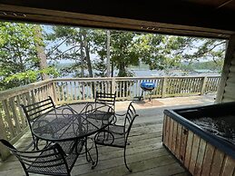 Lake view two bedroom, two bath loft, log-sided cottage with private h