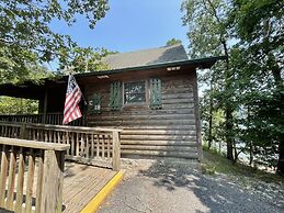Lake view two bedroom, two bath loft, log-sided cottage with private h