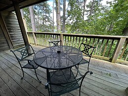 Lake view two bedroom, two bath log-sided cottage with private hot tub