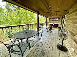 Lake view two bedroom, two bath log-sided cottage with private hot tub